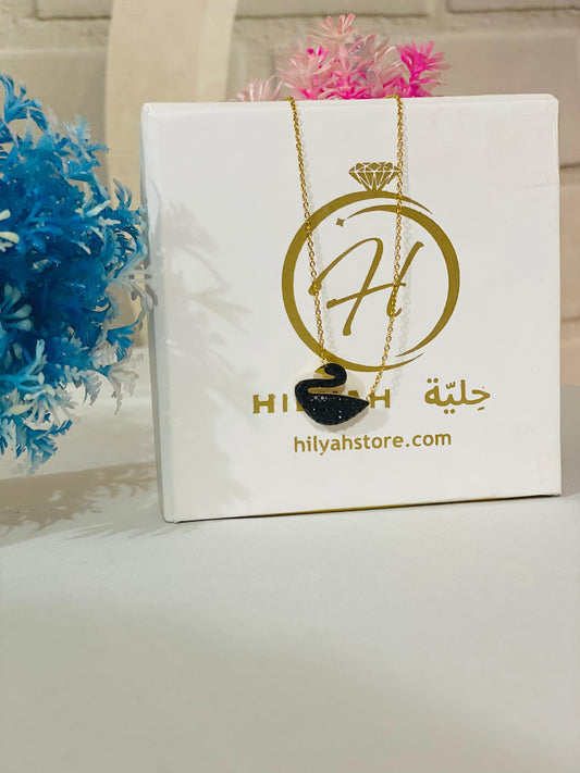 Elegant Black Swan Pendant in Gold-Plated Stainless Steel
